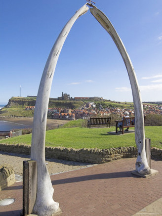 Whalebone Arch on Seafront, with Whitby Abbey Ruin in Distance, Whitby, Yorkshire